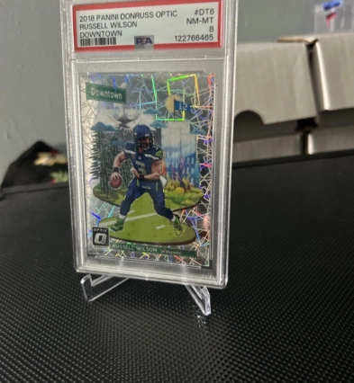 2018 Donruss Optic - Downtown Russell Wilson #DT-6. PSA-8