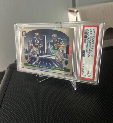 2024 Panini Donruss Optic Downtown Duos Roger Staubach, Drew Pearson #12. PSA-9