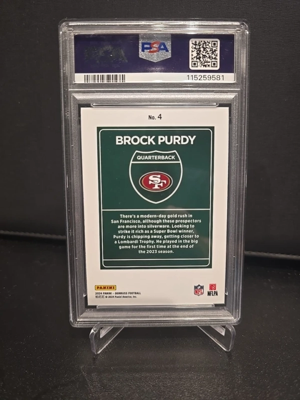 2024 PANINI DONRUSS FOOTBALL BROCK PURDY DOWNTOWN CASE HIT SP #4 PSA 10 - Image 2