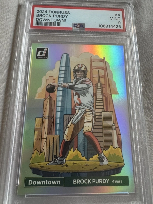 PSA 9! 2024 Panini Donruss - Downtown! Brock Purdy #4