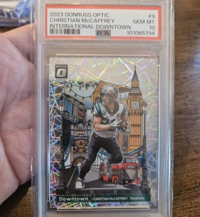 Christian Mccaffrey 2023 Panini Donruss Optic International Downtown #9 PSA 10