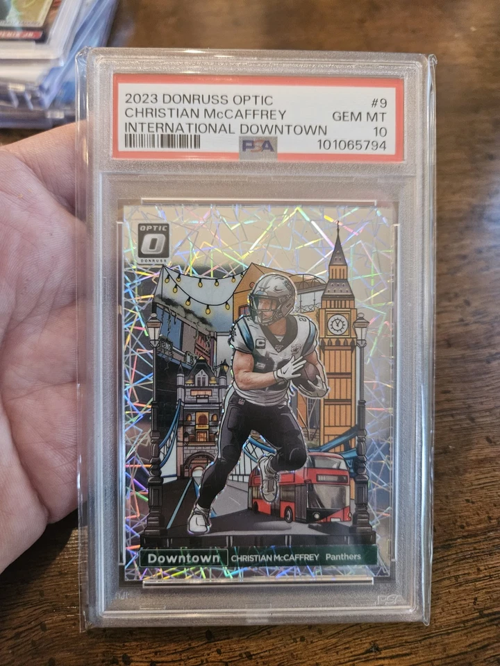 Christian Mccaffrey 2023 Panini Donruss Optic International Downtown #9 PSA 10