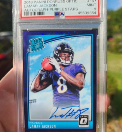 2018 Panini Donruss Optic Lamar Jackson Purple Stars RC Auto 27/50 PSA MINT 9