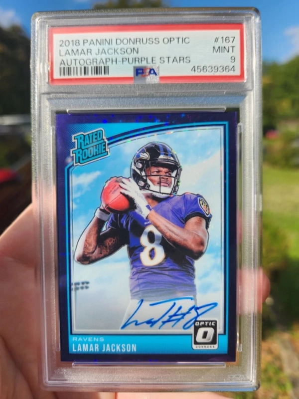 2018 Panini Donruss Optic Lamar Jackson Purple Stars RC Auto 27/50 PSA MINT 9